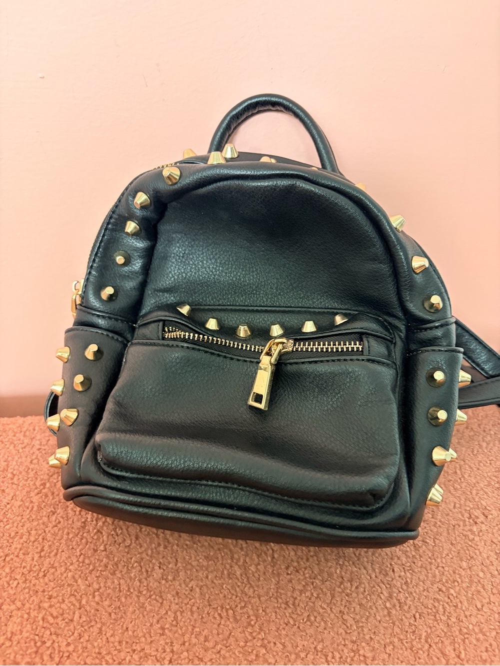 Mini rock n’ roll studded backpack. Vegan leather. Very roomie inside!!